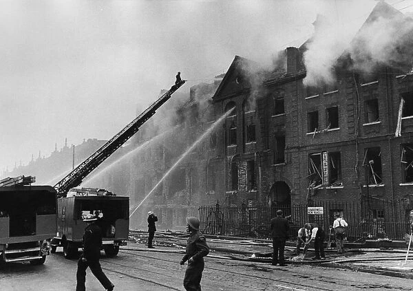 National Fire Service attend the scene of destruction after flying bomb crashed