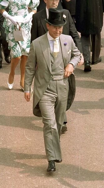 Prince Charles wearing grey suit and top hat at Ascot