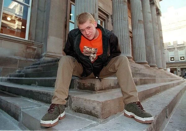 Stephen McCole Scots actor sitting on steps November 1998 star of The Young Person