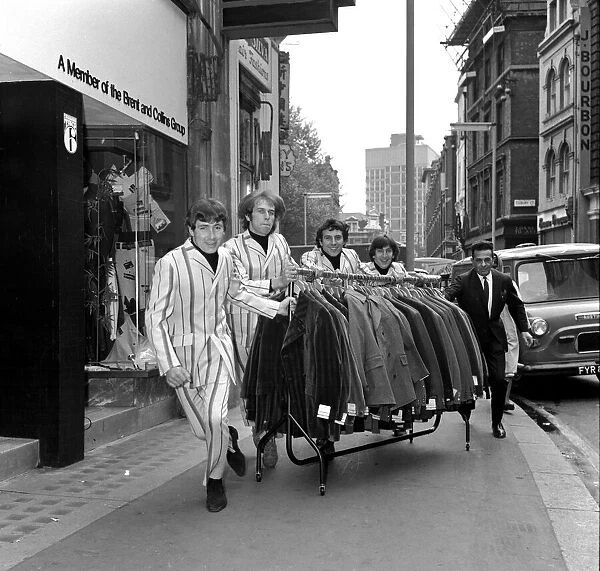 The Troggs pictured together outside 'Take Sir'boutique in Wardour Street