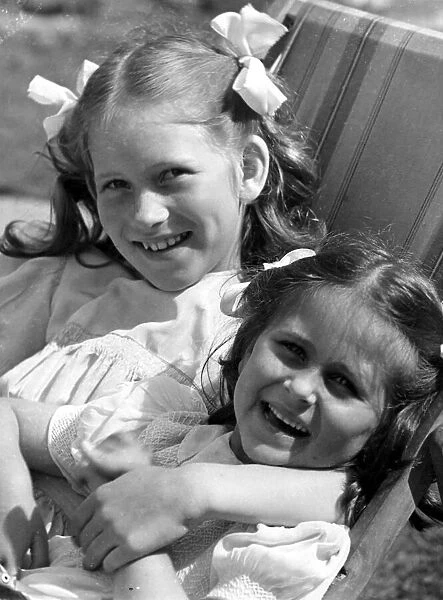Young girls sitting in deck chair c. 1945 P044482