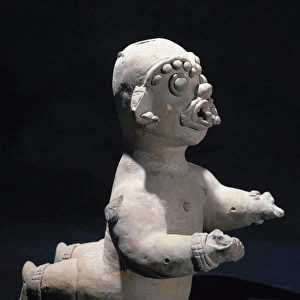 The Ancient Jama-Coaque Culture. Ecuador. Male figure. Kneel