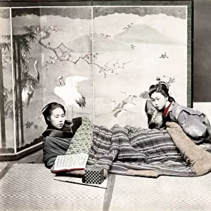 c. 1880s Japan - girls reading under blanket