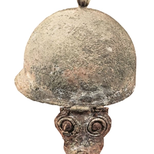 Etruscan bronze helmet