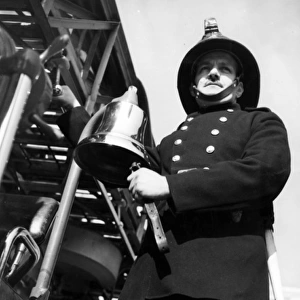 Firefighter adjusting turntable ladder mechanism