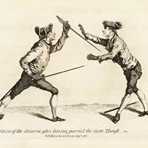 Gentleman fencer taking his opponents sword