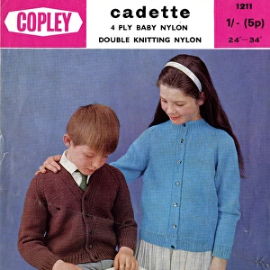 Girl and boy in knitted cardigans