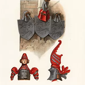 Great helms and shields with heraldic crests, 14th century