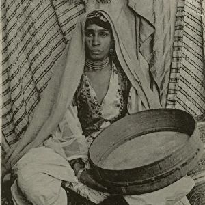A Kabyle musician with her Tam-Tam. Algeria, North Africa