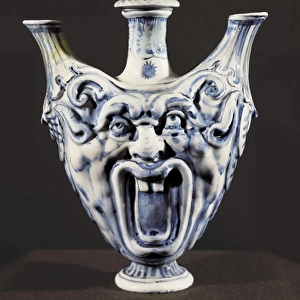 Medici porcelain. Three grotesque-style spouts