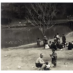 Park at Yokohama, Japan - late 1920s - the boys and men have adopted European Western dress, however, the women still wear traditional costume at this point. Date: 1929