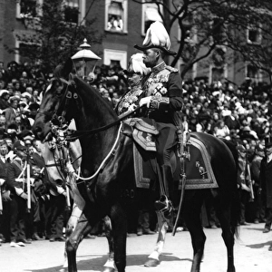 Portrait of King George V riding a horse