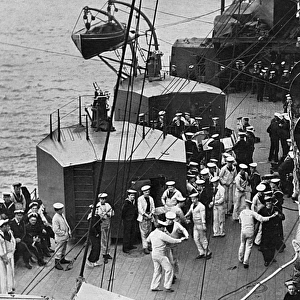 Sailors dancing to ships band on deck, WW1
