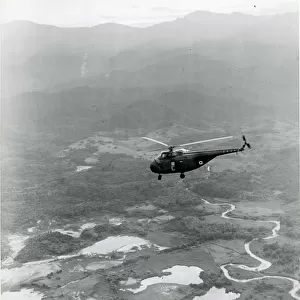 Westland Whirlwind of No155 Squadron over Malaya in 1958