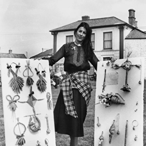 Woman in Cornish traditional costume with Corn Dollies