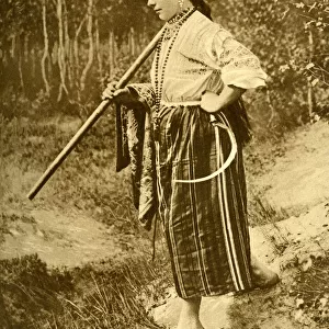 Young woman at harvest time, Republic of Estonia