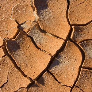 Cracked earth - cracked up earth in a former riverbed. The sun with its merciless power sucks up all humidity and causes the upper crust to break - Mungo National Park, New South Wales, Australia