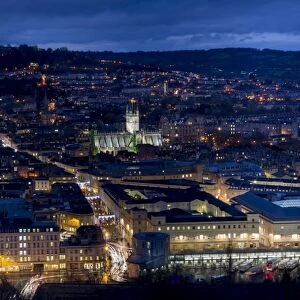 An aerial view of central Bath shows the Abbey and Southgate development at dusk, Bath, Avon, England, United Kingdom, Europe