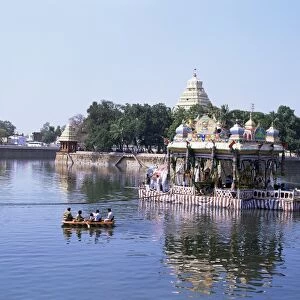 A barge carrying images of Shiva and Meenakshi being