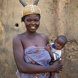 Batammariba mother in a Koutammakou village in North Togo, West Africa, Africa