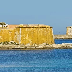 Old city walls and Tower of Ligny dating from 1671, now a Museum of Prehistory, on sea front of this northwest fishing port, Trapani, Sicily, Italy, Mediterranean, Europe