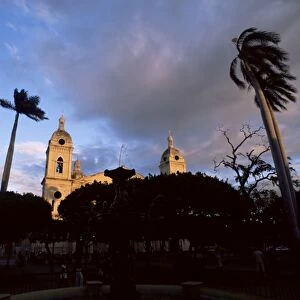 Palm trees in main plaza and Grenada Cathedral