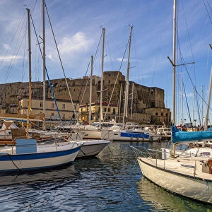 Small harbor with boats in front of the Castel dell Ovo, Naples, Campania, Italy, Mediterranean, Europe
