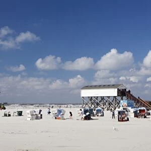 Stilt house and beach chairs on the beach of Sankt Peter Ording, Eiderstedt Peninsula, Schleswig Holstein, Germany, Europe