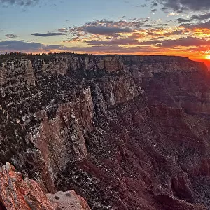 The sun rising at Grand Canyon North Rim, viewed from the Angels Window Overlook at Cape Royal, Grand Canyon National Park, UNESCO World Heritage Site, Arizona, United States of America, North America