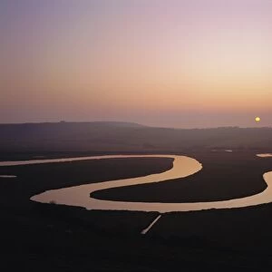 Sunset over the River Cuckmere at Cuckmere Haven, East Sussex, England, UK, Europe