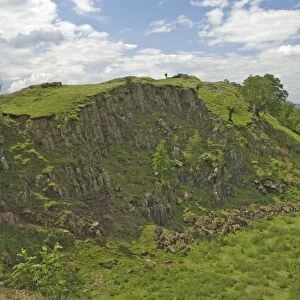 Walltown Crags, walker on the skyline at Turret 45b, Hadrians Wall, Northumbria