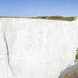 White chalk cliffs of Beachy Head and lighthouse, South Downs National Park, near Eastbourne