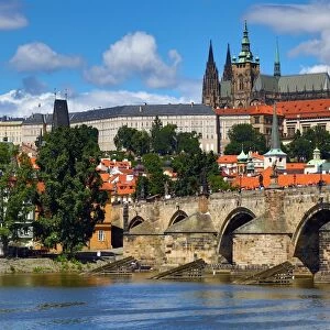 St. Vitus Cathedral and Prague Castle with the Charles Bridge over the Vltava River in Prague