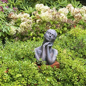 Christine Baxters sculpture Sunworshipper at Borde Hill Garden, Sussex, England