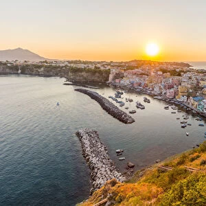 Italy, Campania, Province of Naples, Procida. Sunset at Marina di Corricella