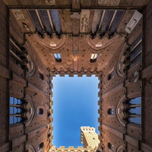 Siena, Tuscany, Italy, Europe. Classic bottom view of Palazzo Pubblico with Del