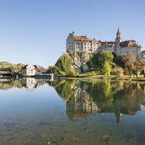 Sigmaringen castle reflects itself on the Danube river. Sigmaringen, Baden-Wurttemberg, Germany