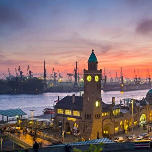 St. Pauli LandungsbrAoken and the Elbe River at sunset, Hamburg, Germany