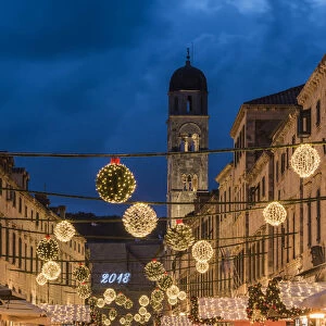Stradun pedestrian street adorned with Christmas lights and decorations, Dubrovnik