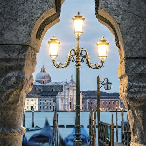 Venice, Veneto, Italy. St Marks waterfront and San Giorgio Maggiore at dusk