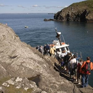 Tourists boarding the Dale Princess at Martins Haven, Martins Haven, Pembrokeshire, Wales, UK, Europe