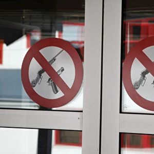 No firearms prohibitive sign for weapons at entrance to bank, worlds most northerly town, Longyearbyen, Spitsbergen