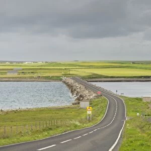 Road on causeway linking islands, originally built to close entrance and protect Scapa Flow, Churchill Barrier