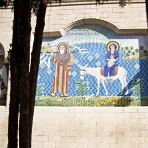 Egypt, Cairo. Mosaic mural of the Holy Family along the Nile after their flight into