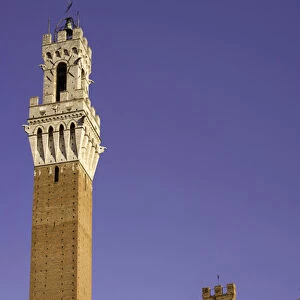 Europe, Italy, Tuscany, Sienna. Tower and clock view of Torre del Mangia in the Piazza del Campo