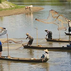 Fishermen fishing on the river, Bago, Bago Region, Myanmar