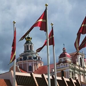 Flag poles and church spires in Town Hall Square, Vilnius, Lithuania