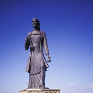 Greece, Epirus, Zagorohoria. Statue of Epirote woman near Monodendri