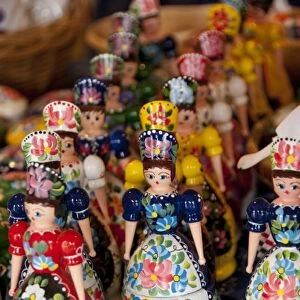 Hungary, Kalocsa. Typical Hungarian souvenirs, wooden dolls in traditional costume