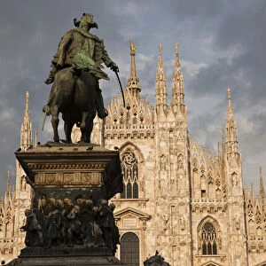 ITALY, Milan Province, Milan. Milan Cathedral and statue, late afternoon